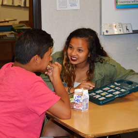 Students eating and talking