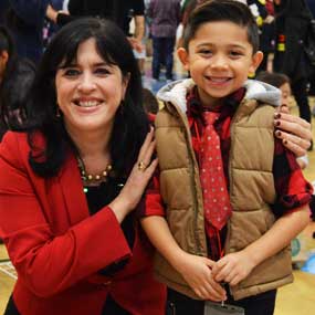 Superintendent Gabriela Mafi and a student